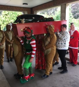 Christmas funeral in July